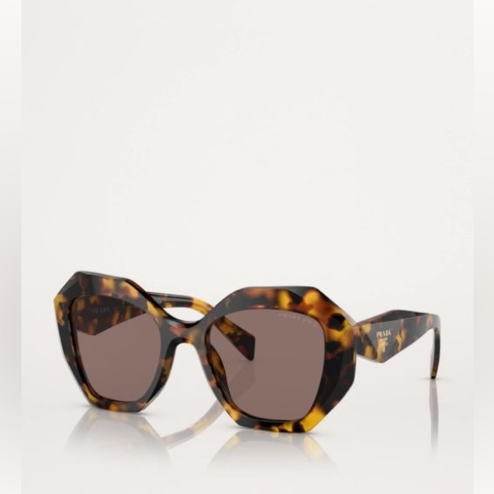 Prada women’s polarized sunglasses with case